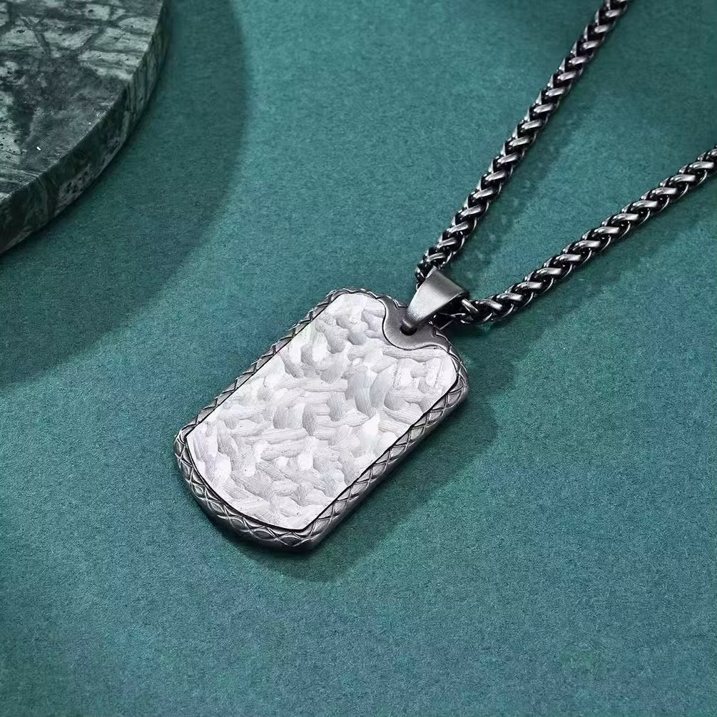 The Hammered Steel Dog Tag